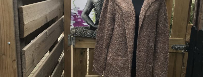 Vest gebreid lang gemeleerd caramel Vest gebreid lang gemeleerd caramel